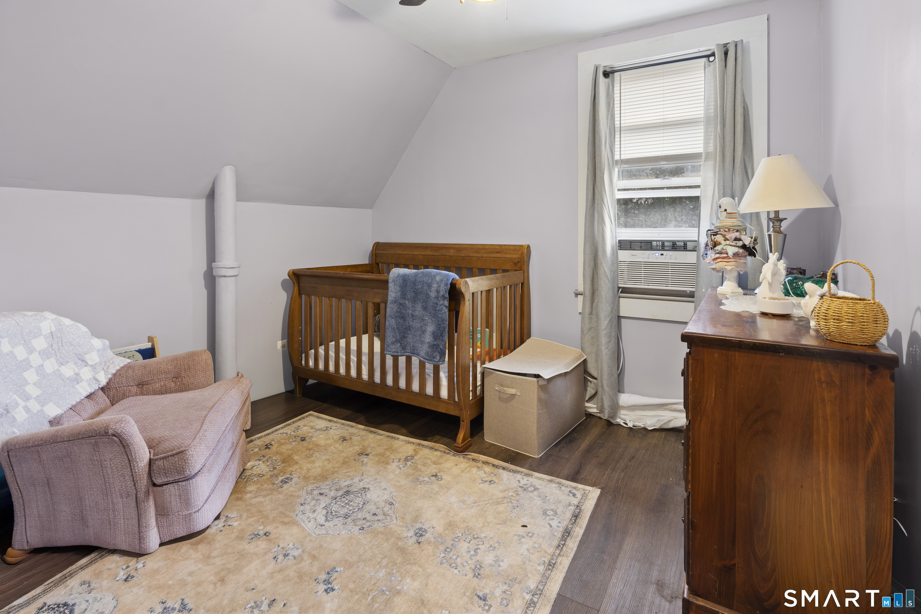 47 Broad Street Killingly, CT 06239 - Photo 22 of 33 a living room with furniture and a window