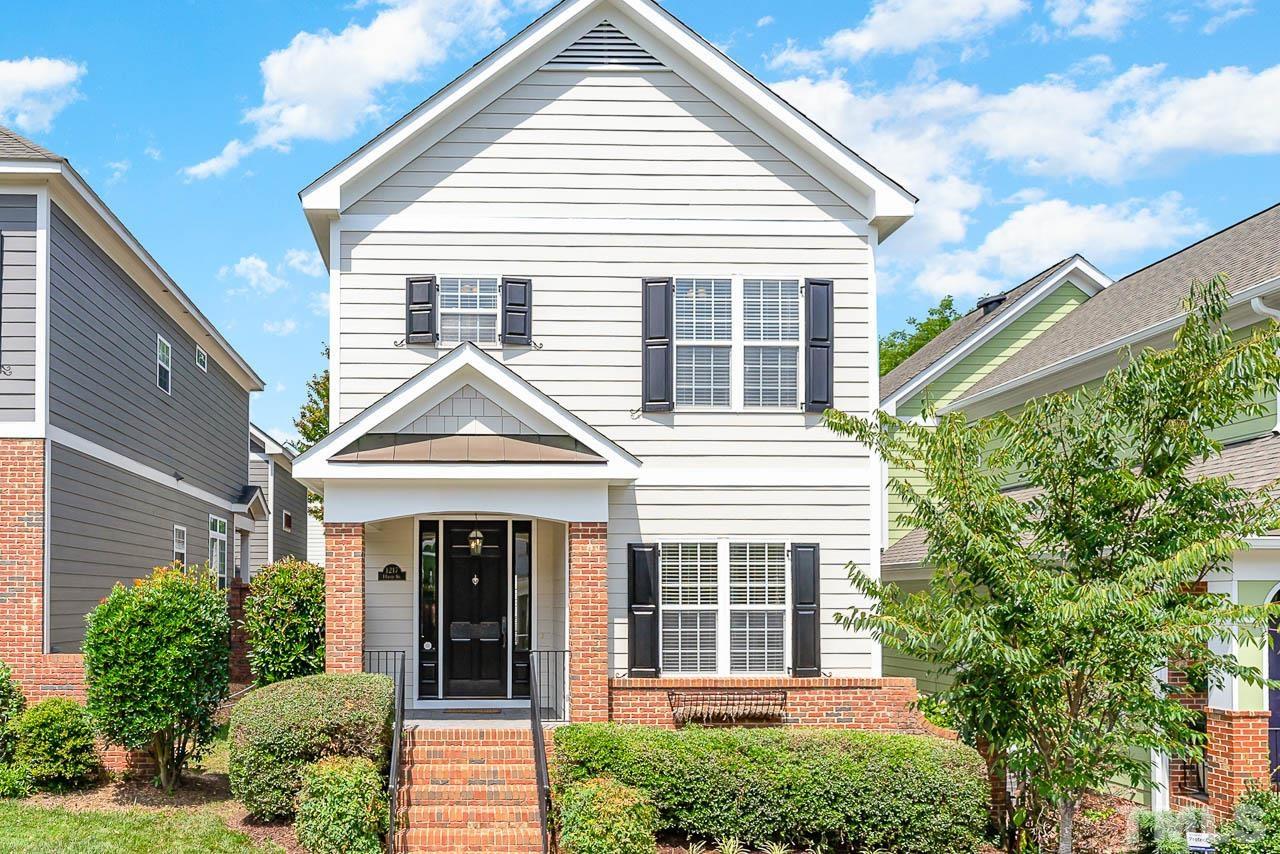 a front view of a house with a porch