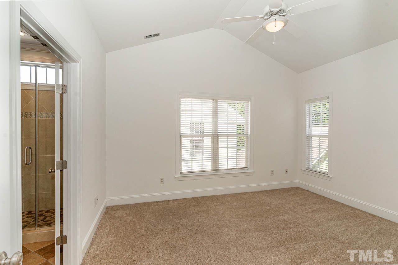 1217 Harp Street Raleigh, NC 27604 - Photo 13 of 27 an empty room with windows and closet