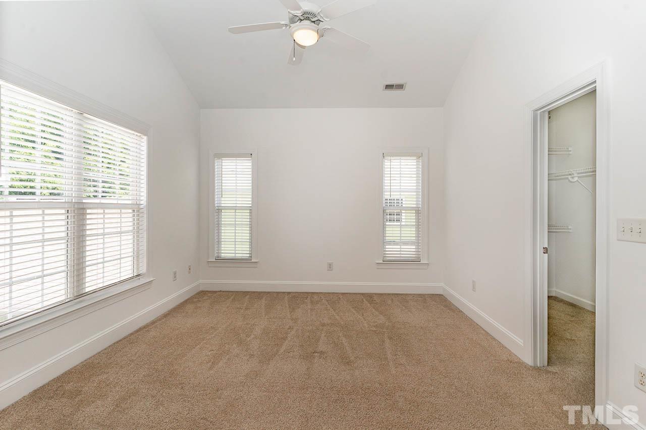 1217 Harp Street Raleigh, NC 27604 - Photo 16 of 27 a view of an empty room with a window