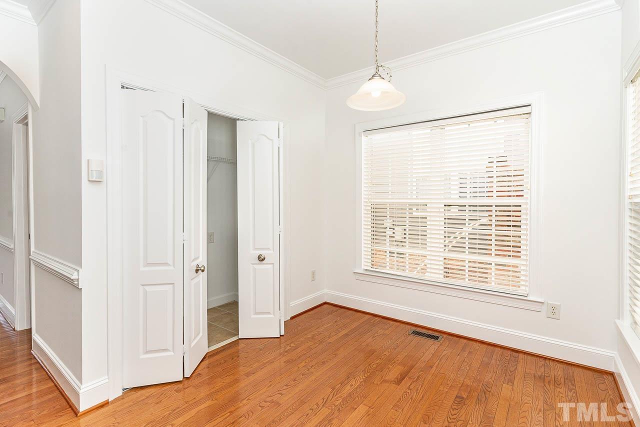 1217 Harp Street Raleigh, NC 27604 - Photo 6 of 27 a bedroom with a bed and a window
