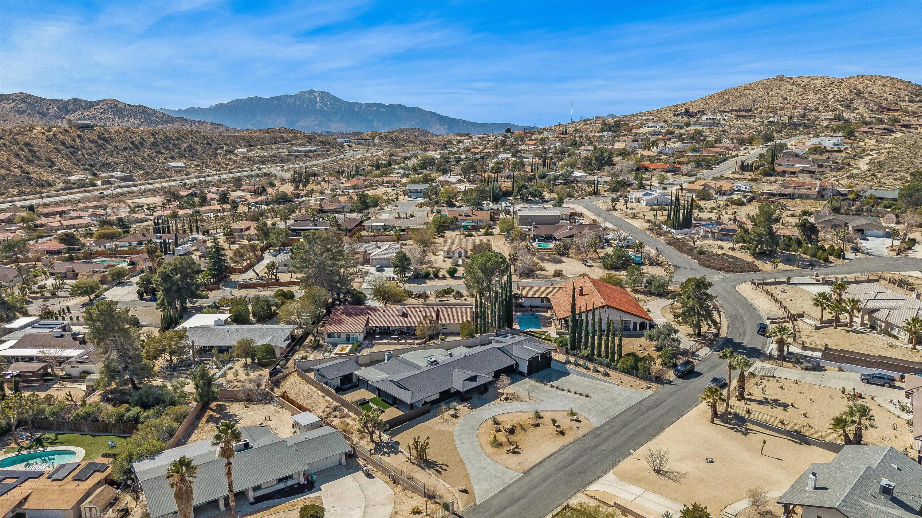 7458 Cardillo Trail Yucca Valley, CA 92284 - Photo 3 of 47 an aerial view of a city