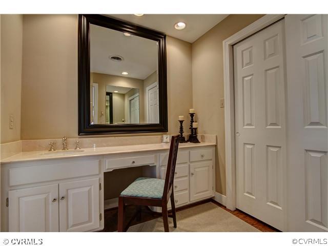 2310 Banstead Road Midlothian, VA 23113 - Photo 11 of 21 a bathroom with a sink mirror and a vanity