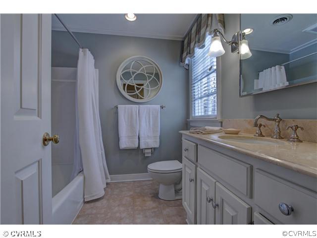 2310 Banstead Road Midlothian, VA 23113 - Photo 12 of 21 a bathroom with a toilet sink and mirror
