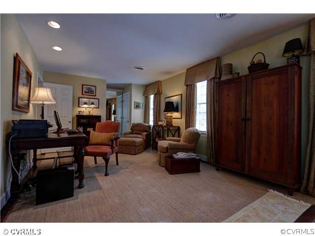 2310 Banstead Road Midlothian, VA 23113 - Photo 14 of 21 a living room with furniture a flat screen tv and a window