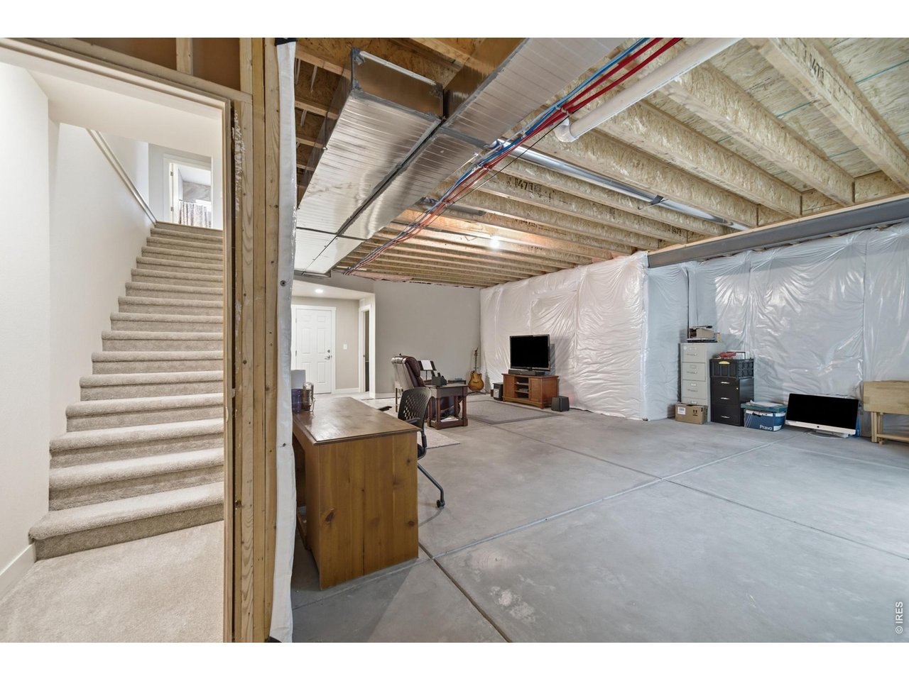 1263 Swainson Road Eaton, CO 80615 - Photo 17 of 29 Walk downstairs to the full basement.
