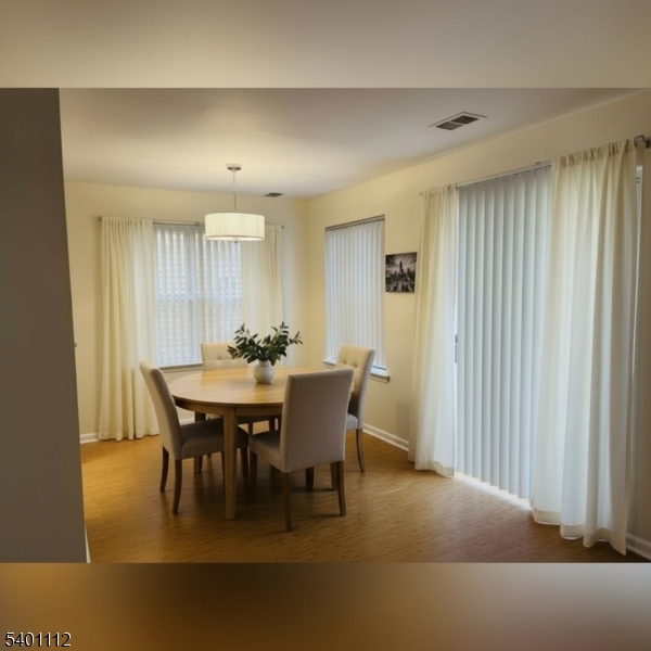 71 Sage Court, Unit 71 Bedminster, NJ 07921 - Photo 4 of 10 a view of a dining room with furniture