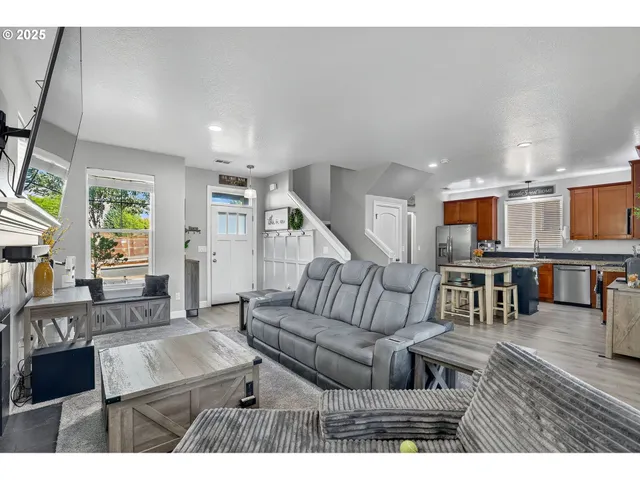 a living room with furniture and a table