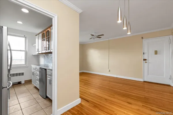 a view of a kitchen from the hallway