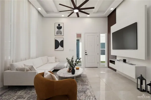 a living room with furniture and a flat screen tv