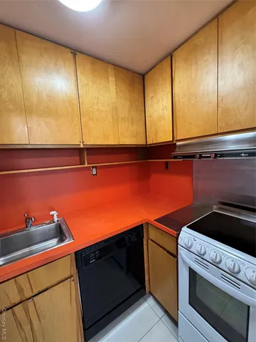 a utility room with washer and dryer