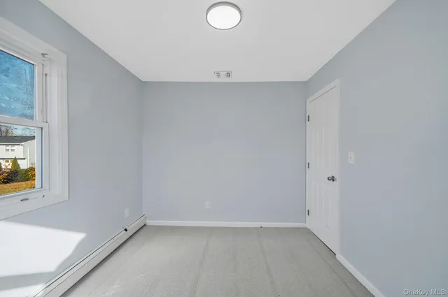 a living room with furniture a wooden floor and a table