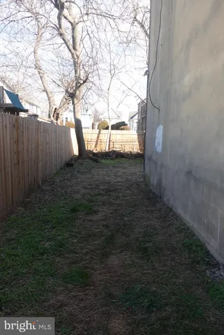 a view of outdoor space with furniture and a potted plant