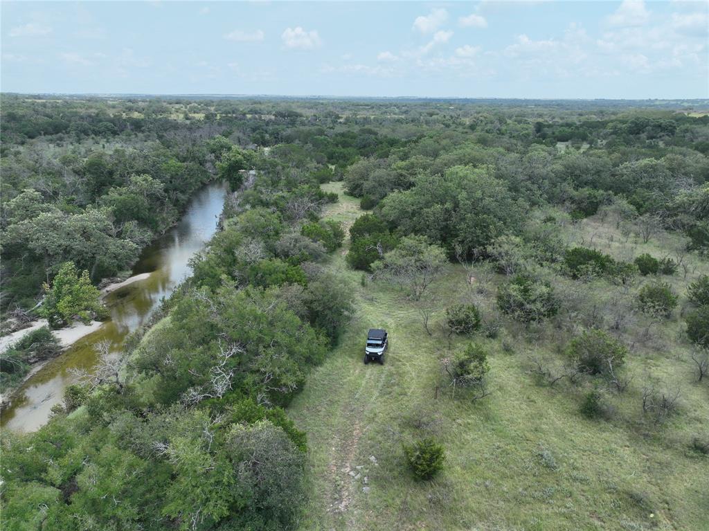 281 Highway 281, Unit O281S Evant, TX 76525 - Photo 19 of 36 Aerial view of property's location featuring a forest
