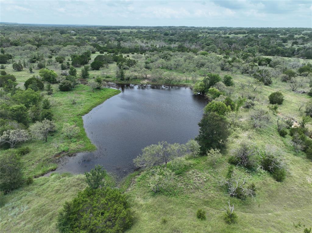 281 Highway 281, Unit O281S Evant, TX 76525 - Photo 22 of 37 Aerial view of property's location featuring a nearby body of water
