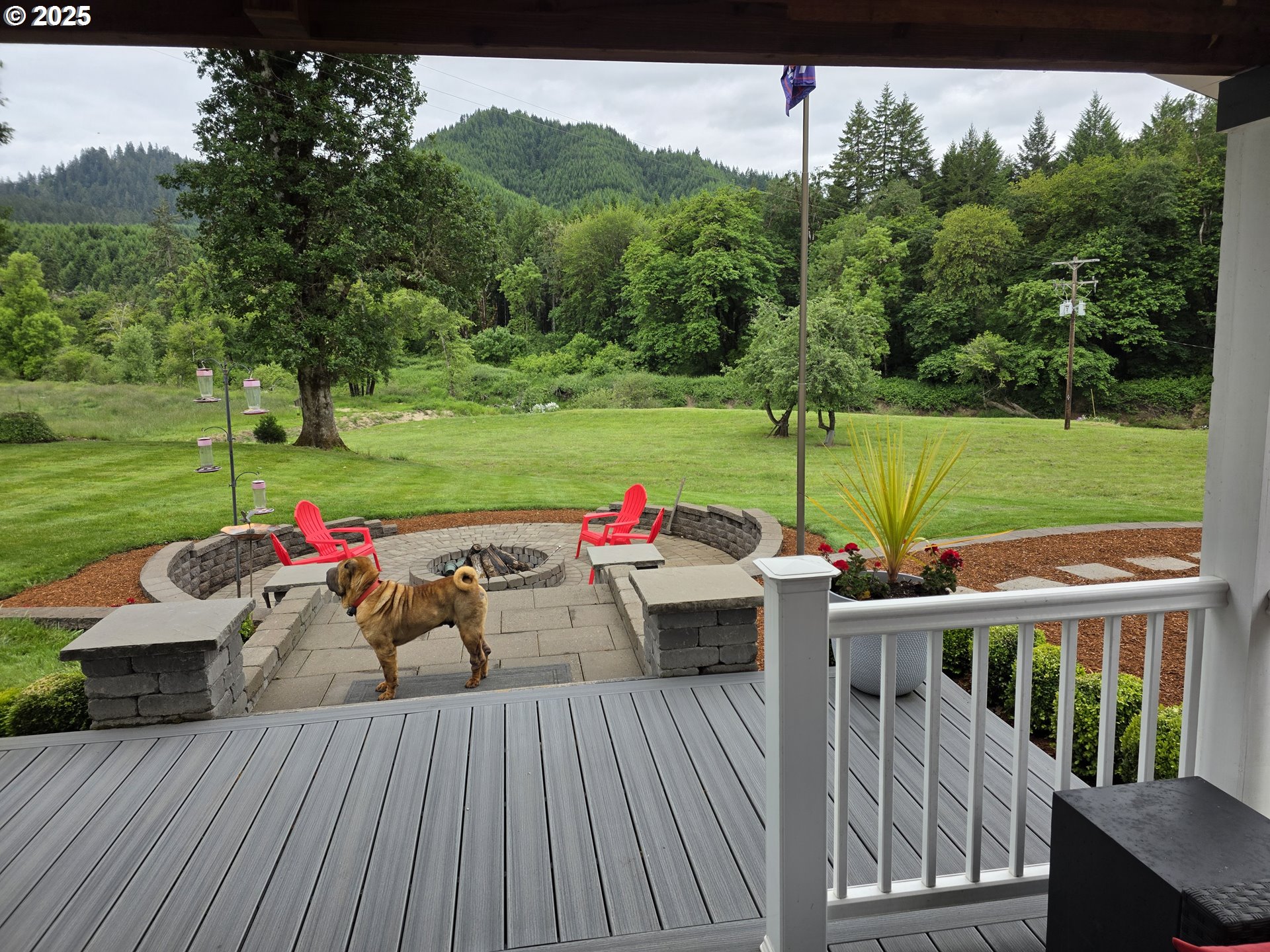 4340 Highway 38 Drain, OR 97435 - Photo 12 of 22 a view of a deck with wooden floor and outdoor seating
