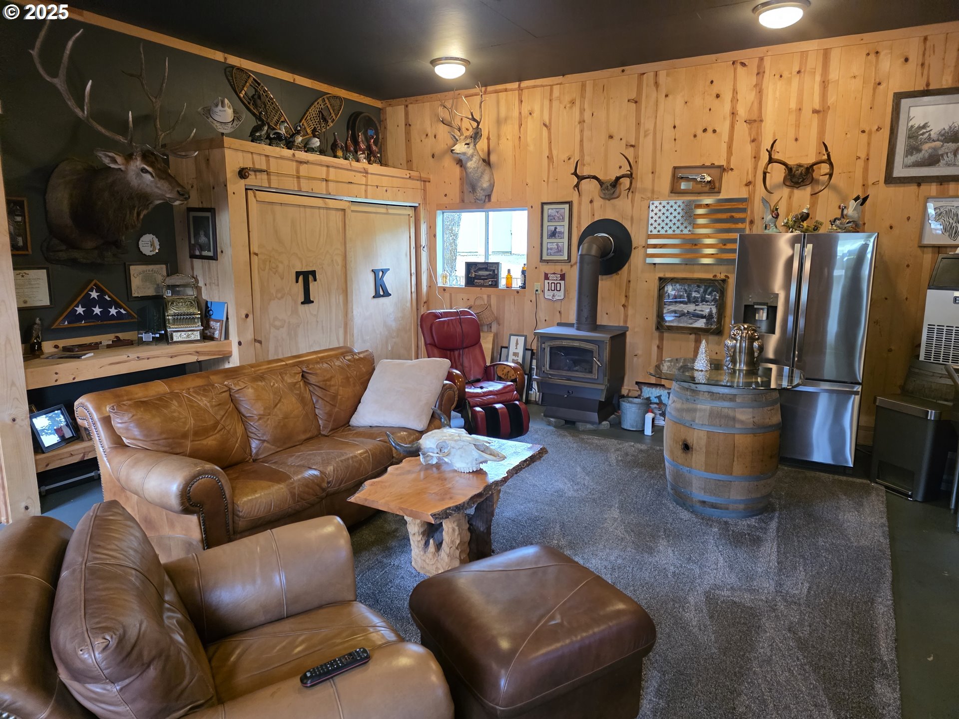4340 Highway 38 Drain, OR 97435 - Photo 16 of 22 a living room with furniture and a fireplace