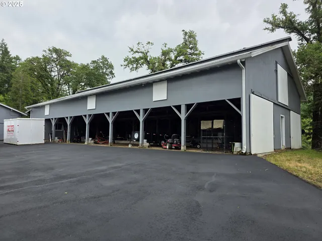 a front view of a house with garage