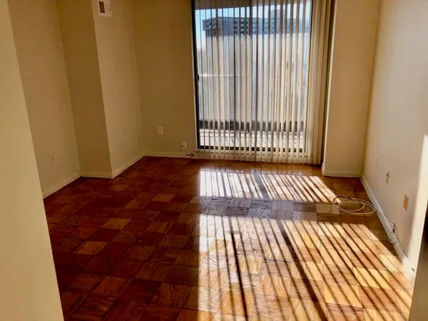 a view of outdoor space with wooden floor