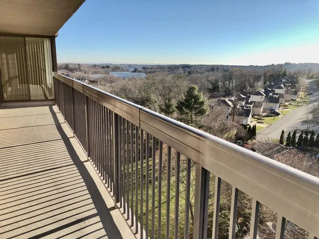 a view of a balcony with city view