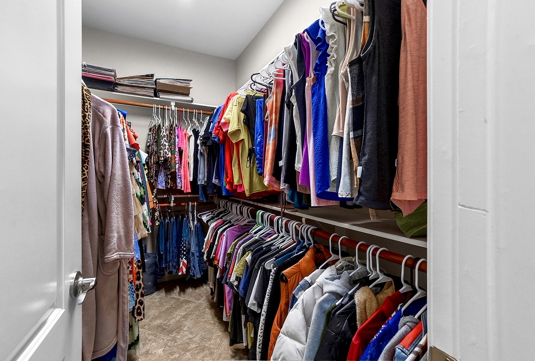 2951 Bobby Jones Road Katy, TX 77494 - Photo 28 of 50 One of the two large walk-in closets offers plenty of space for all your storage needs, complete with built-in shelving and hanging rods for optimal organization.
