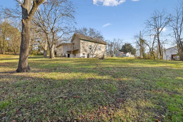 a big room with lots of trees and plants