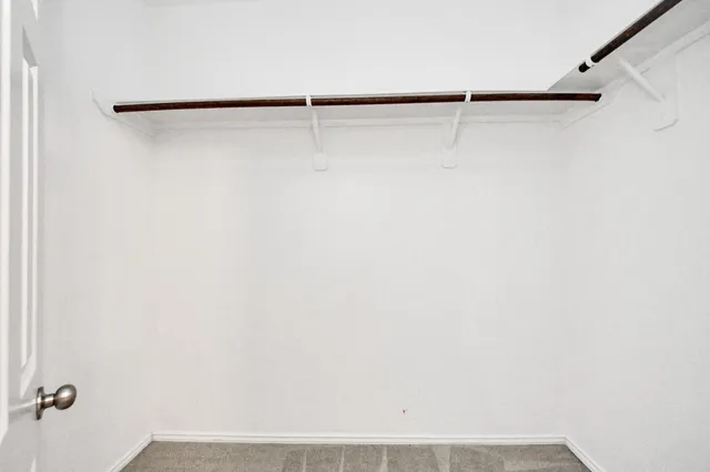 a view of small space with racks on the wall