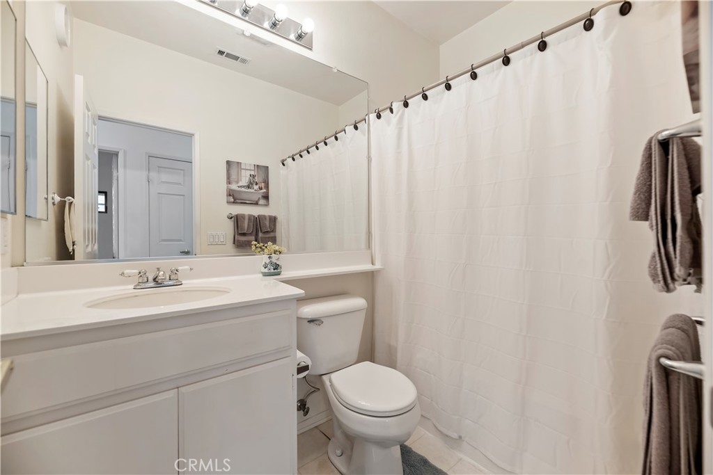 2664 Hazy Way Banning, CA 92220 - Photo 21 of 56 a bathroom with a sink toilet and a mirror