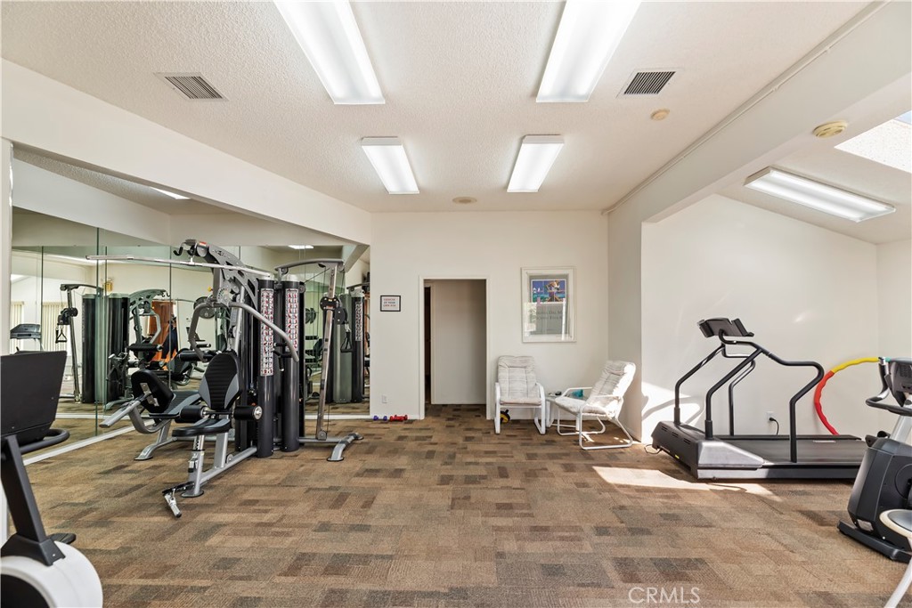 2664 Hazy Way Banning, CA 92220 - Photo 31 of 56 a view of a room with gym equipment