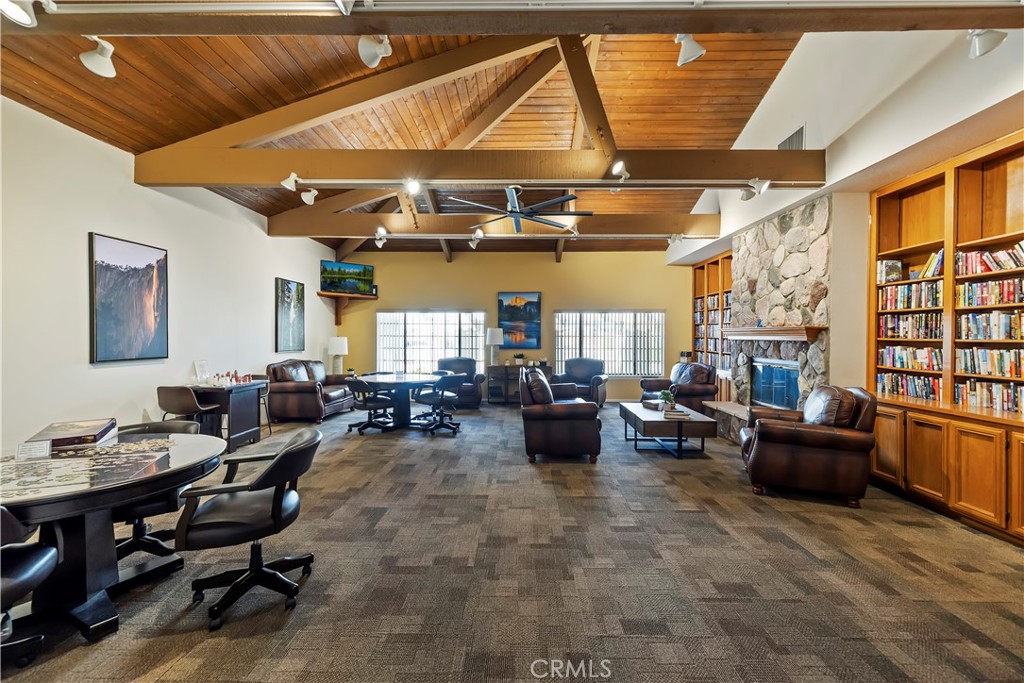 2664 Hazy Way Banning, CA 92220 - Photo 33 of 56 a living room with furniture and a flat screen tv