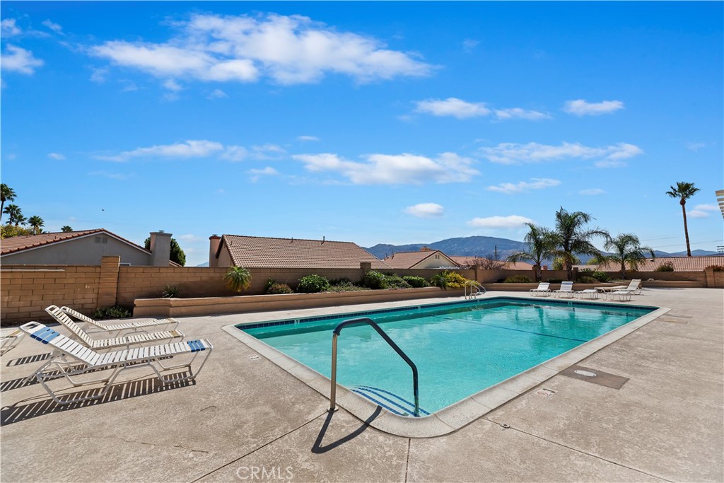 2664 Hazy Way Banning, CA 92220 - Photo 41 of 56 a view of a swimming pool and lounge chairs