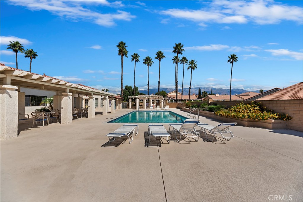 2664 Hazy Way Banning, CA 92220 - Photo 42 of 56 a view of a house with swimming pool and porch