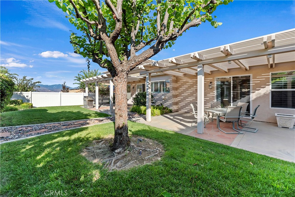 2664 Hazy Way Banning, CA 92220 - Photo 45 of 56 a front view of a house with garden and porch
