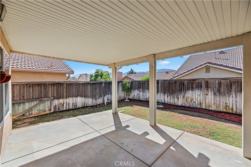 2664 Hazy Way Banning, CA 92220 - Photo 7 of 56 a view of a backyard with wooden fence