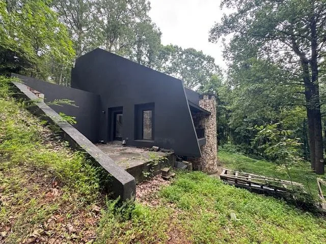 a backyard of a house with lots of green space