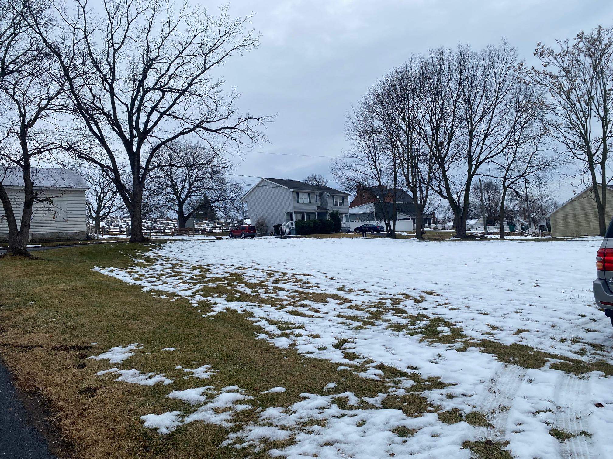 0 Community Circle Timberville, VA 22853 - Photo 2 of 3 a street view covered with snow