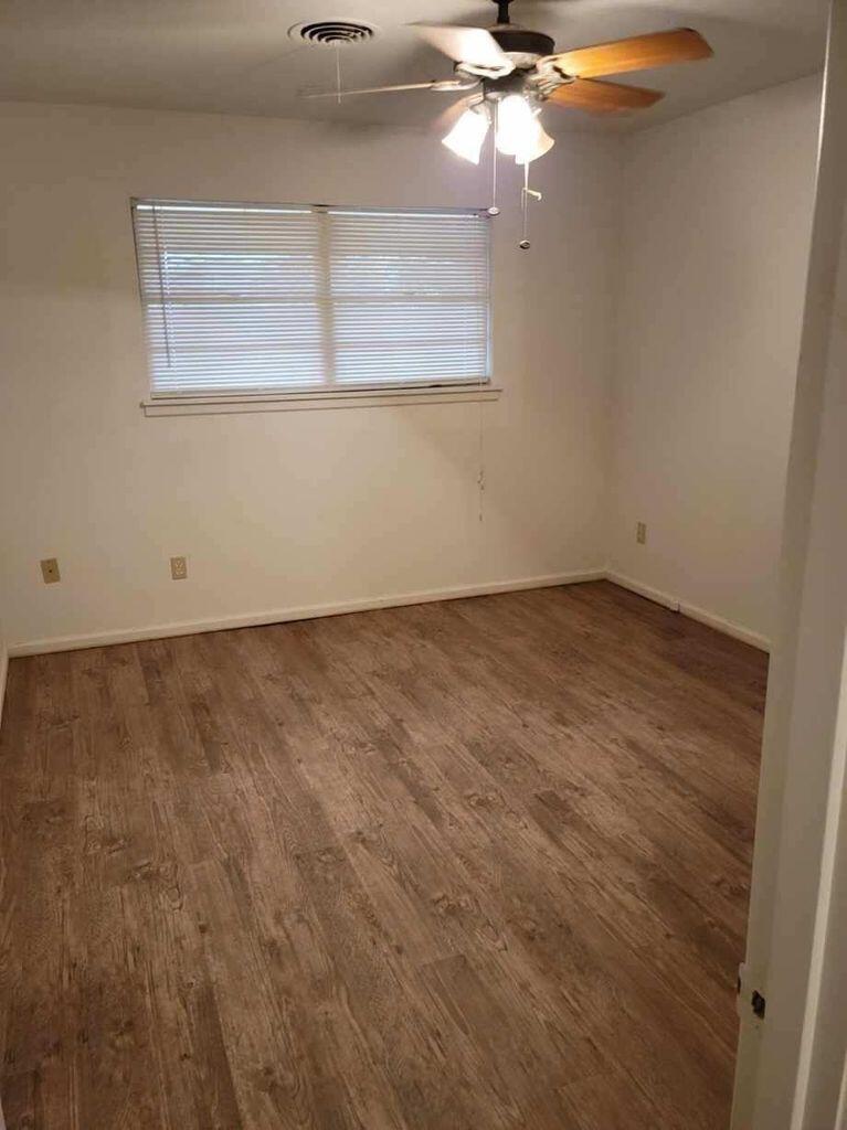 4412 29th Street Lubbock, TX 79410 - Photo 3 of 7 a view of an empty room with a window