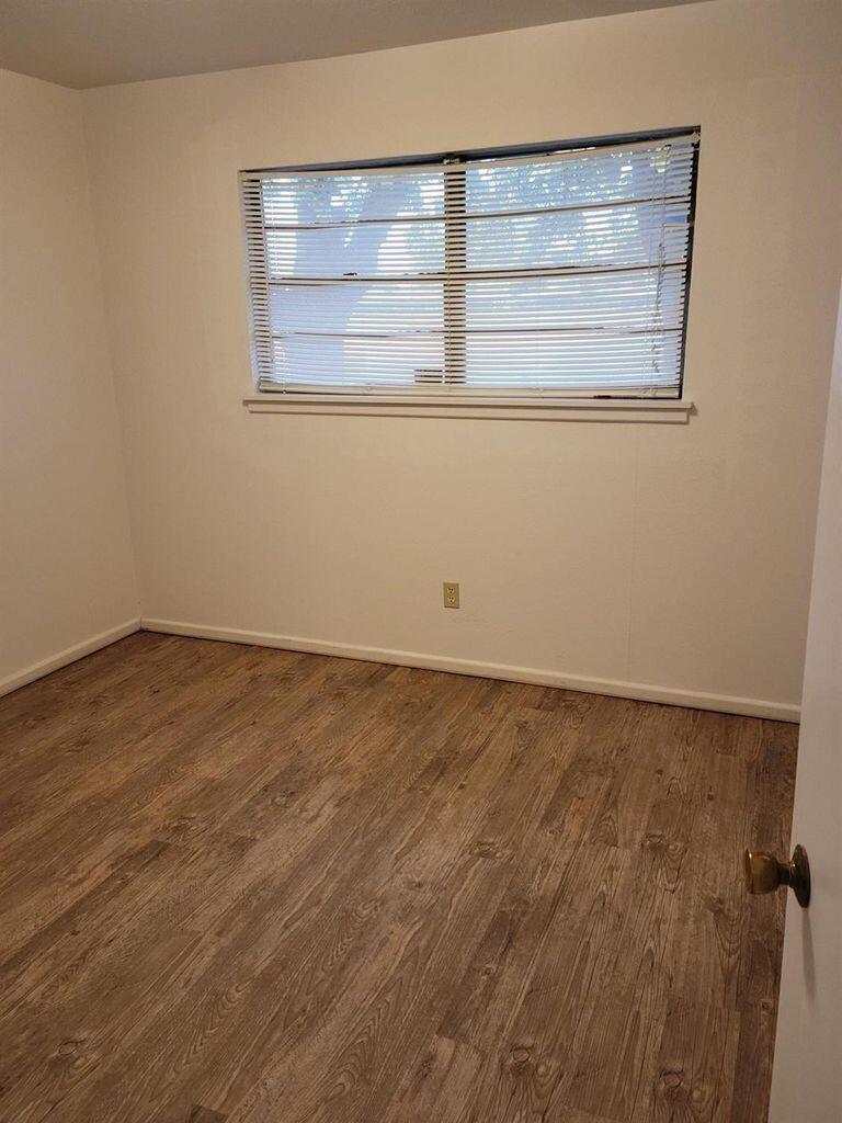 4412 29th Street Lubbock, TX 79410 - Photo 6 of 7 an empty room with a empty space