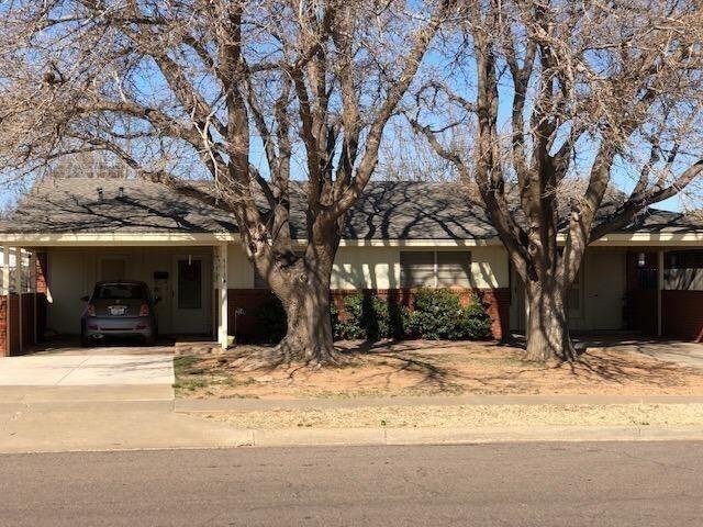 4412 29th Street Lubbock, TX 79410 - Photo 7 of 7 a view of a house with snow on the background
