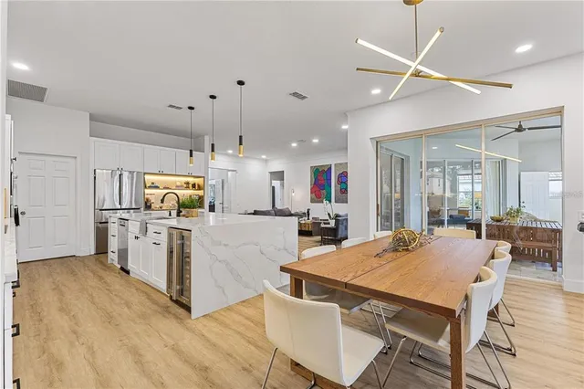 a view of a livingroom with furniture and a window