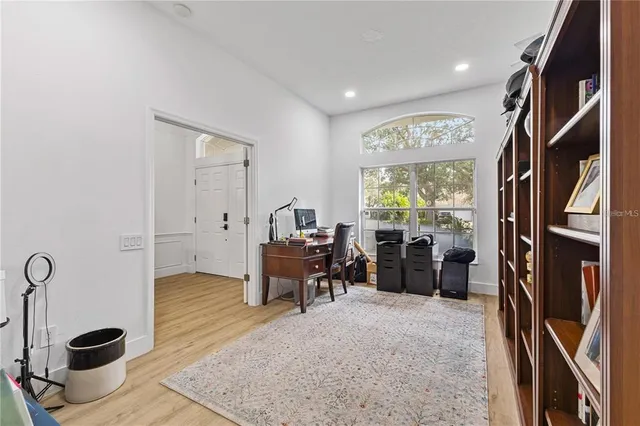 a white toilet sitting next to a bathroom sink