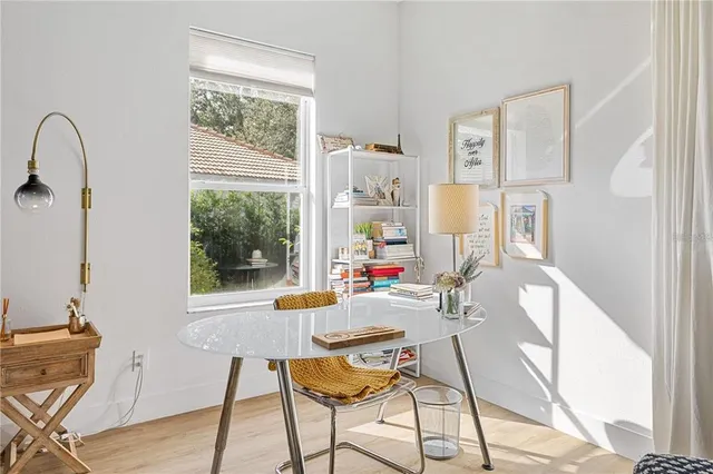 a room with a bed and a window