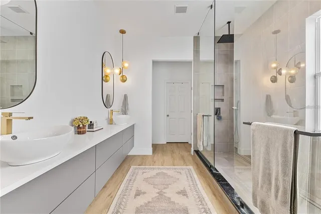 a bed room with a bed and a television