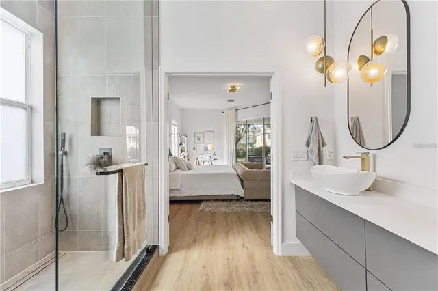 a bedroom with a bed and dresser