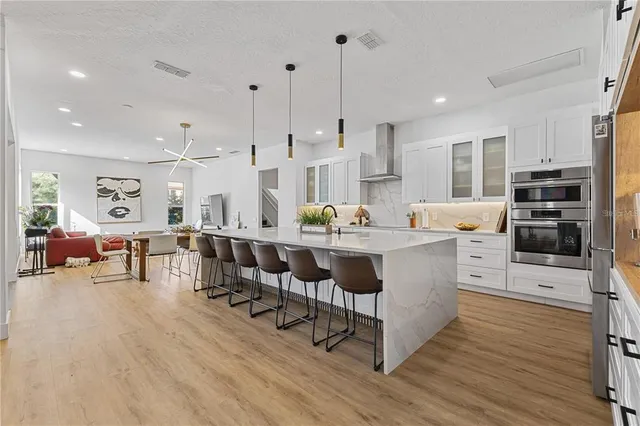 a large kitchen with cabinets