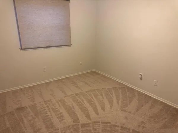 a bathroom with a sink a toilet a mirror and vanity