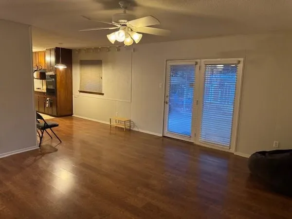 a kitchen with sink cabinets and washing machine
