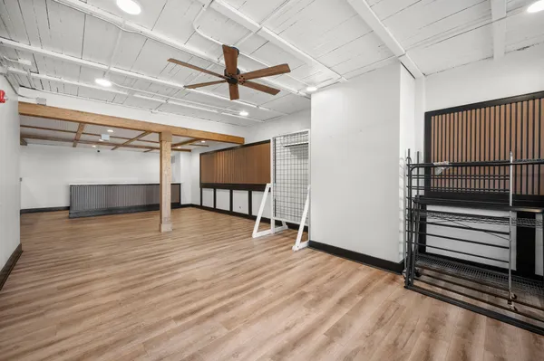 a view of a livingroom with wooden floor