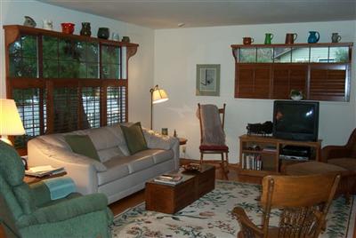 352 Springdale Street Sebastopol, CA 95472 - Photo 4 of 12 Living rooms has shutters and wood valances.