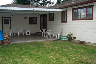 352 Springdale Street Sebastopol, CA 95472 - Photo 8 of 12 This patio is connects the dining area with the garage. There is another door from the garage to the kitchen.